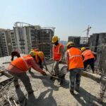 Migrant labourers at a construction site.