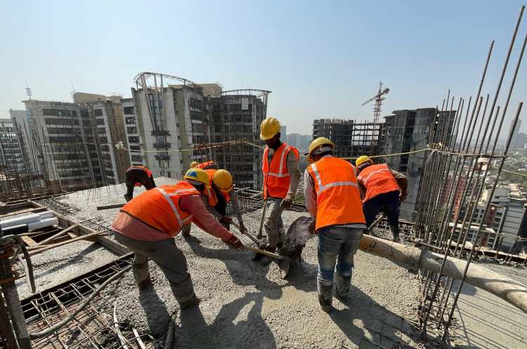 Migrant labourers at a construction site.
